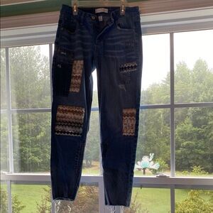 Blue Boyfriend Jeans with Contrast Stitching and Distressed Details
